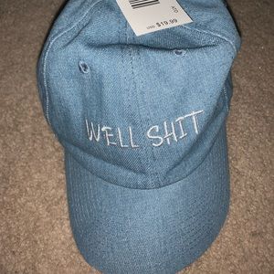 Funny light blue hat! “Well Shit”